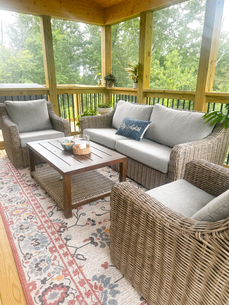 outdoor furniture set with gray cushions and light gray wicker