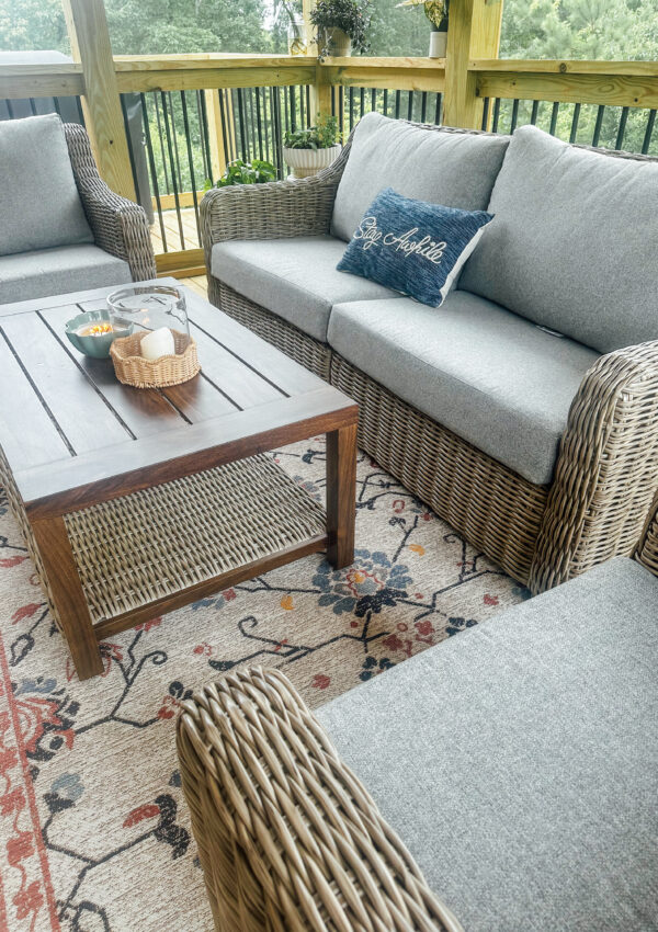outdoor furniture set with gray cushions and light gray wicker
